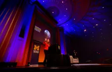 Katharine Hayhoe presenting in an auditorium